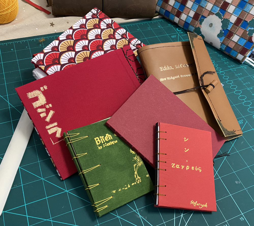 A pile of hand-bound books
