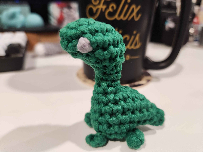 A crocheted dinosaur