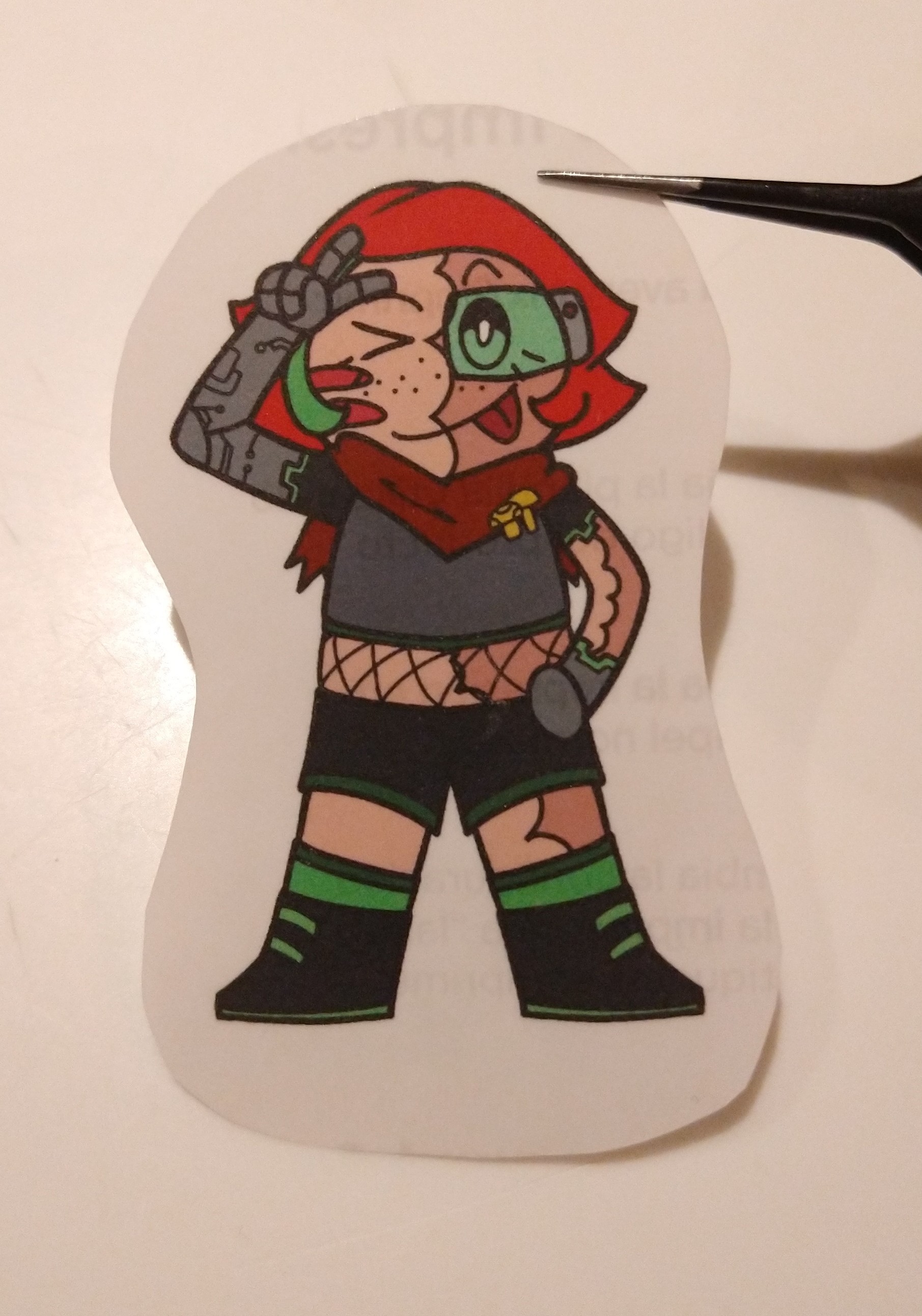 A superhero charm made of shrinkable plastic