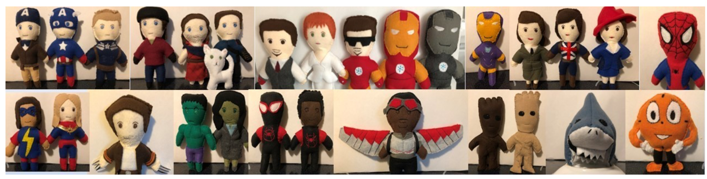 A wide variety of small felt dolls of various characters